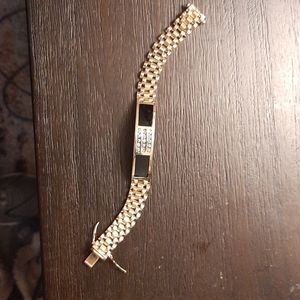 14K gold diamond and onyx bracelet